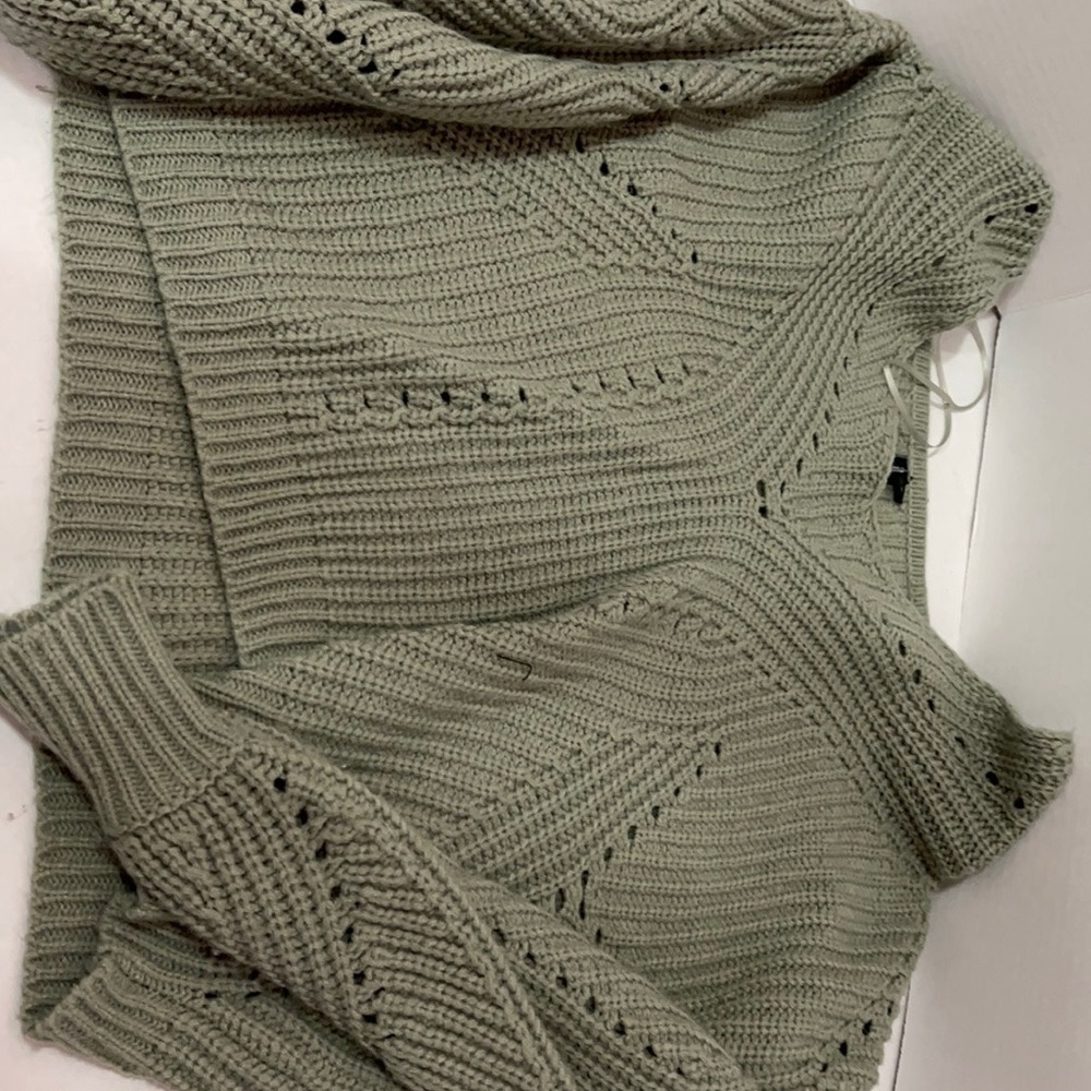 Cropped green sweater